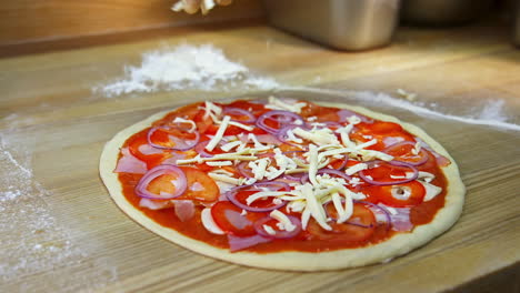 the process of making pizza. chef preparing pizza in restaurant kitchen