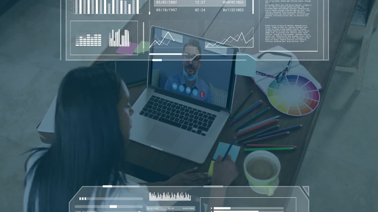 Seated woman joining remote call at wooden table, reviewing design data with HUD charts overlaying