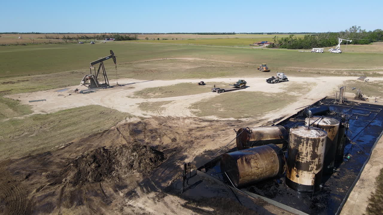 Drone shot over spilled oil and broken containers, Twister aftermath in Kansas