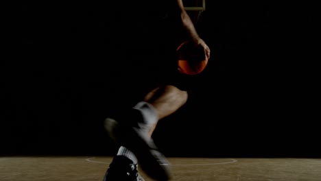 male basketball player playing in the court 4k