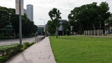 a peaceful walkway in a city park setting.