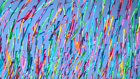 Hundreds-of-colorful-flags-flutter-in-the-wind-hanging-as-ornaments-in-the-streets-of-Oaxaca