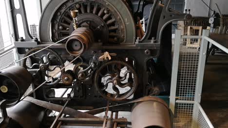 old textile weaving machinery, with gears and belts