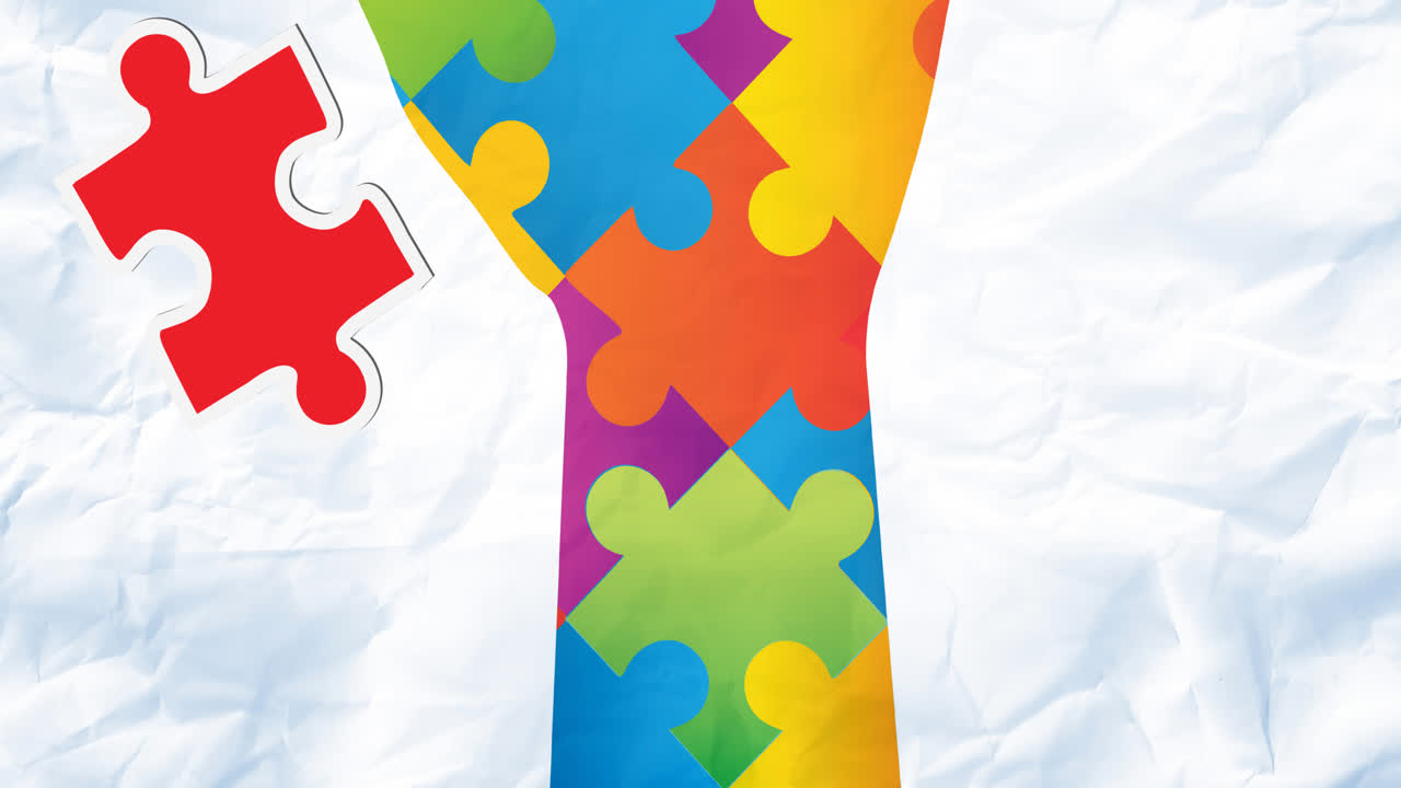 빨간색과 노란색의 퍼즐이 손에 떨어지는 애니메이션, 자폐증에 대한 인식 퍼즐이 색으로 형성됩니다.