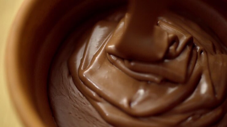 Cake batter is being poured