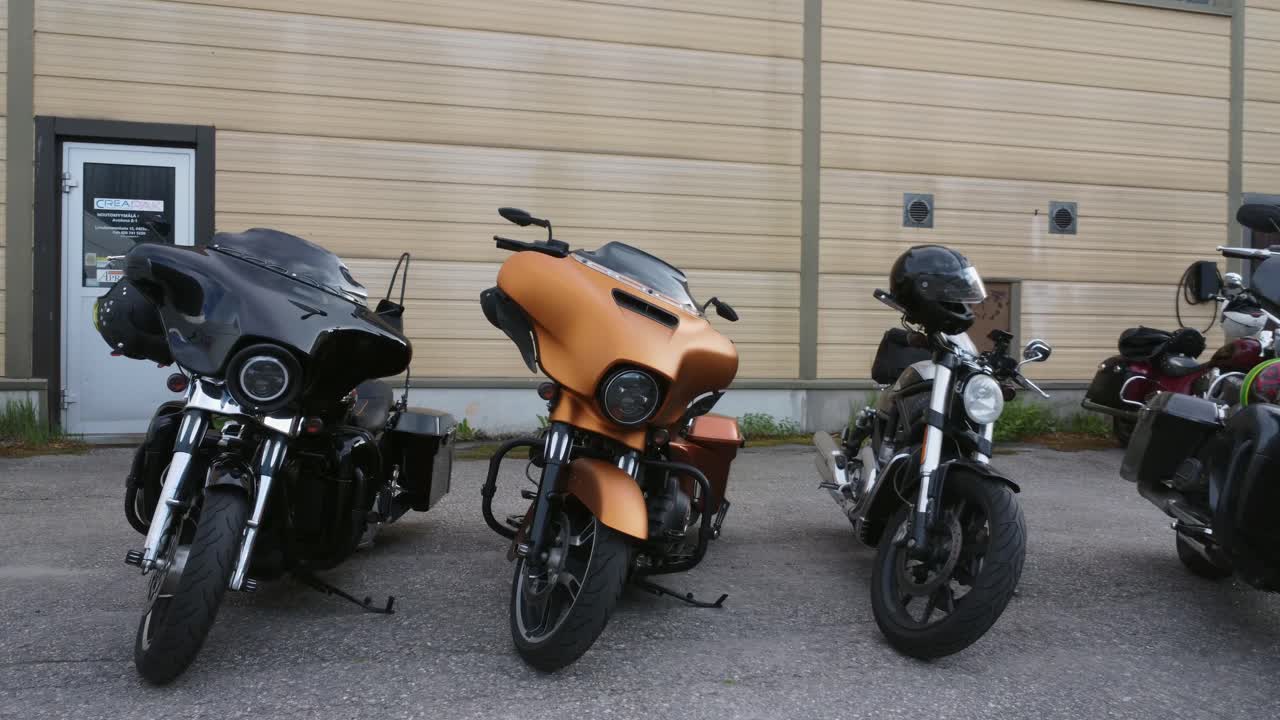 Custom Harley Davidson motorcycles lined up for group ride in Finland