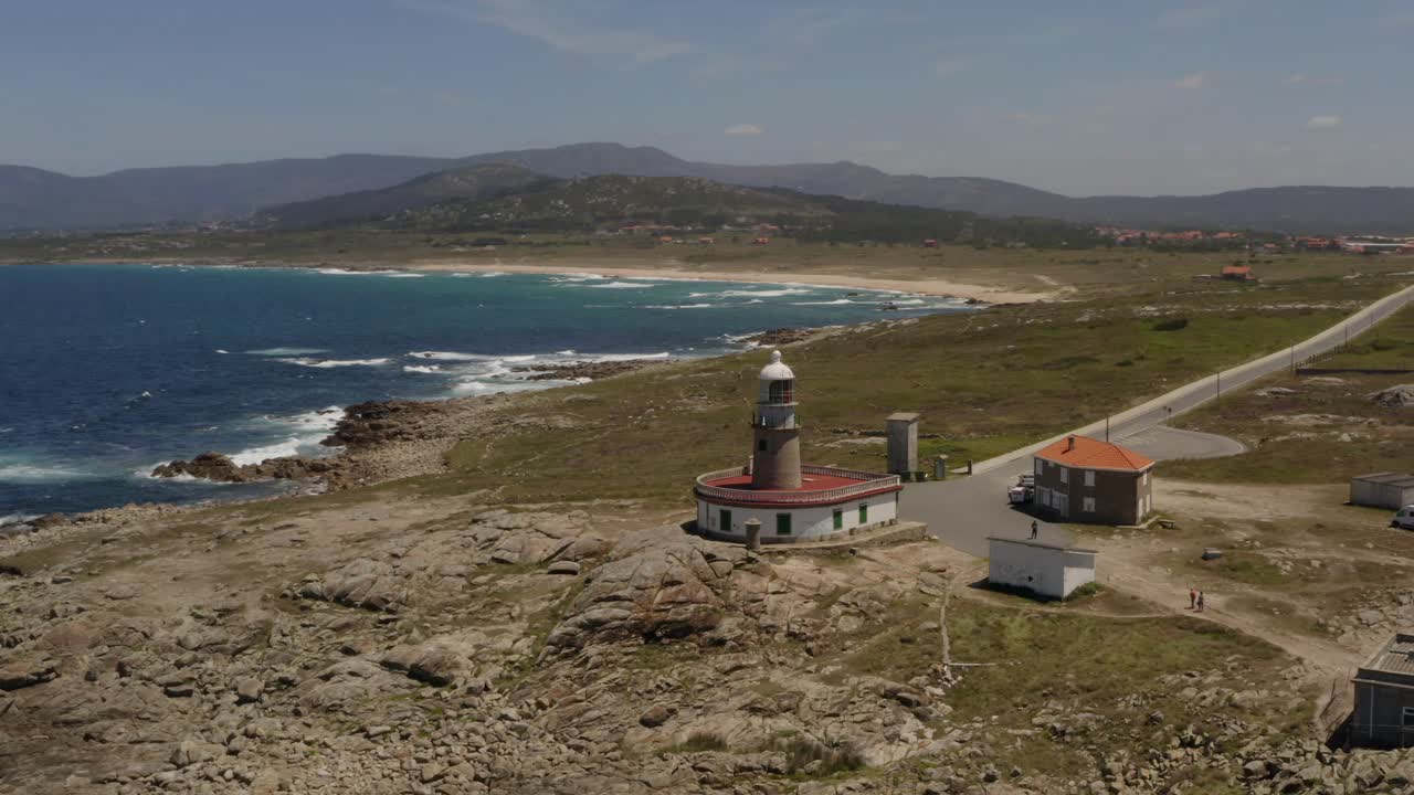 Cinematic slow motion bird eye view of the "Faro de Corrubedo