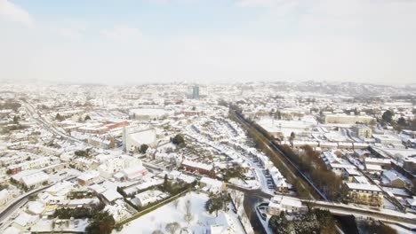 Aerial-view-of-snow-covered-town-4k