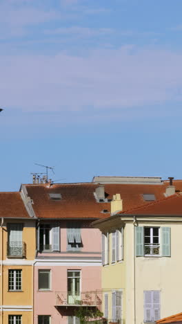 colorful european townhouses under a sunny sky