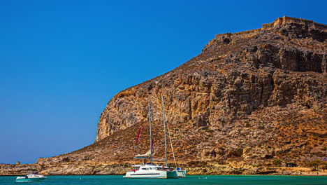 time lapse of summer boats sailing pristine sea water landscape of gramvousa beach, greece