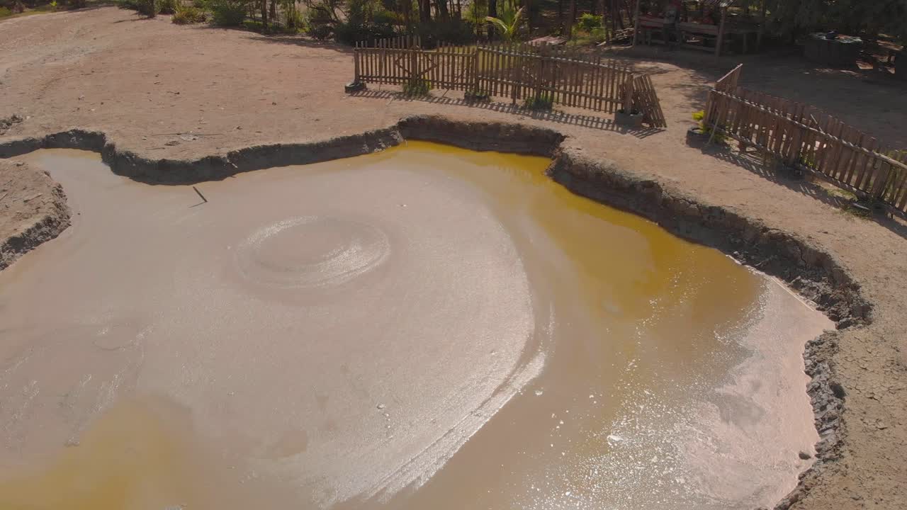 Bubbling therapuetic mud volcano L'eau Michel located in the southern village of Penal, Trinidad