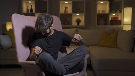 man having a nervous breakdown at home is shouting.
