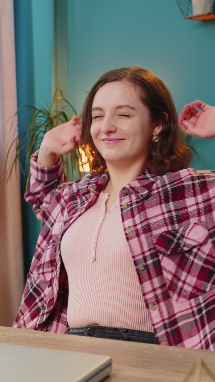 Business woman freelancer closing laptop taking break leaning on chair relaxing after working