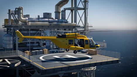 yellow helicopter at an offshore oil rig helipad