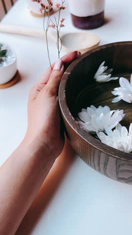 flowers in a wooden bowl