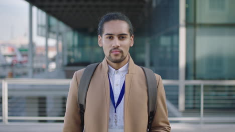 portrait-of-young-successful-businessman-intern-looking-confident-at-camera-corporate-career-achievement