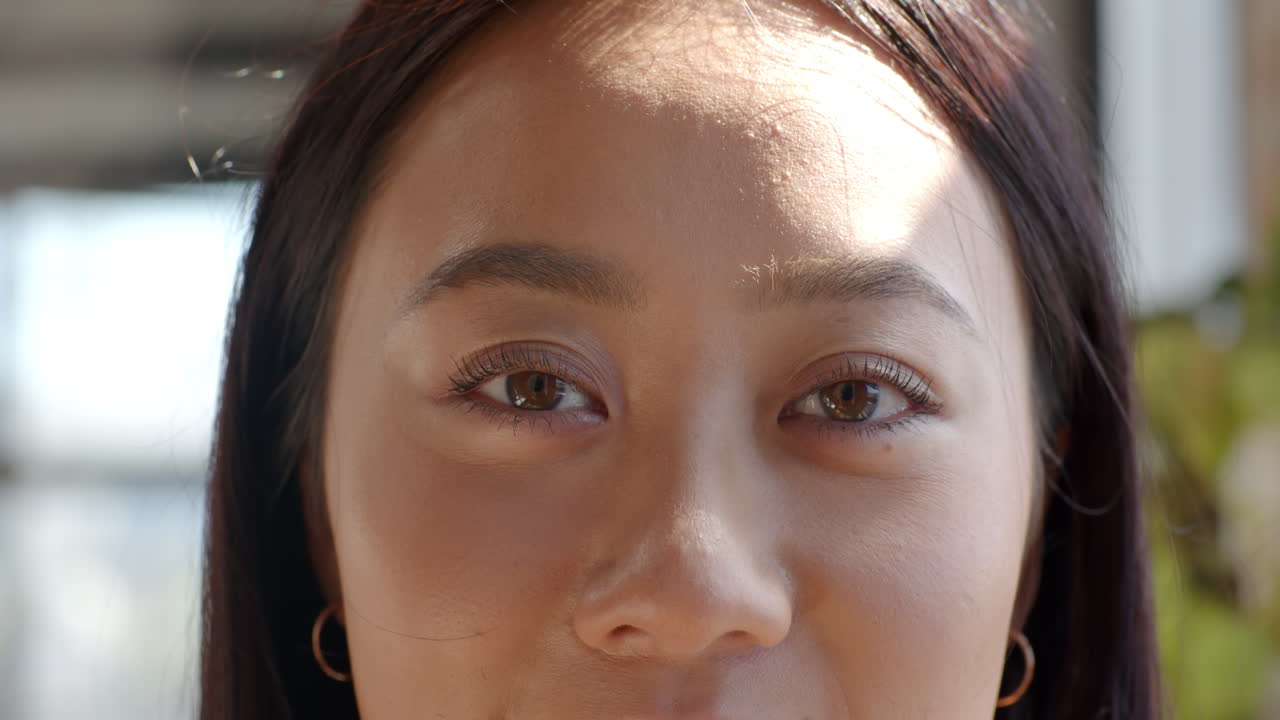 Confident woman in office, focused and ready for coding challenges