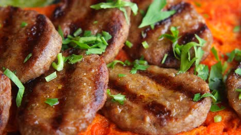grilled turkish kofta meatballs with orange sauce