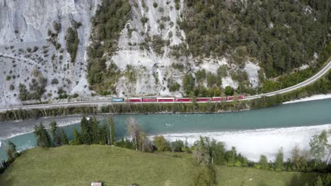 following a picturesque train drive through the valley of the swiss river rhine