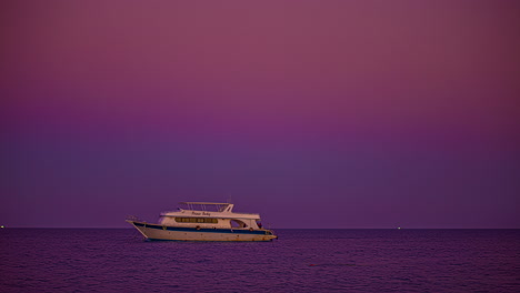 luxury yacht on the red sea at sunset - time lapse