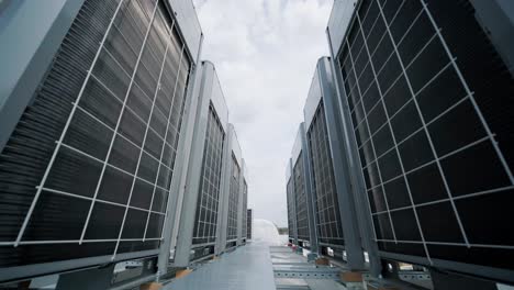 the air conditioning and ventilation system of a large industrial facility is located on the roof. it includes an air conditioner, smoke exhaust, and ventilation.