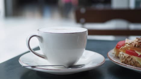 coffee and sandwich at a cafe