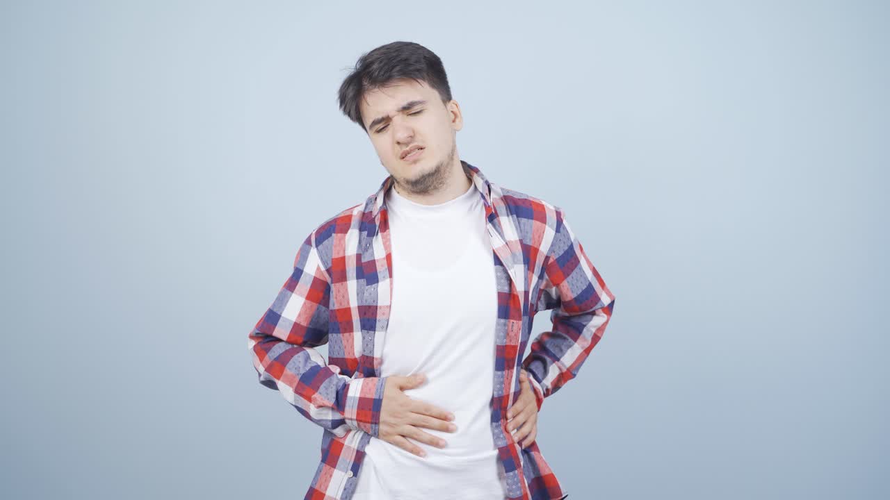 Man experiencing stomachache.