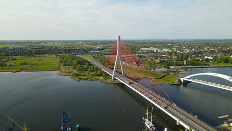 Puente-Del-Tercer-Milenio-Juan-Pablo-Ii-Y-Puente-Ferroviario-Del-Puerto-De-Gdansk---Drone-Aéreo---Conceptos-De-Transporte-E-Infraestructura