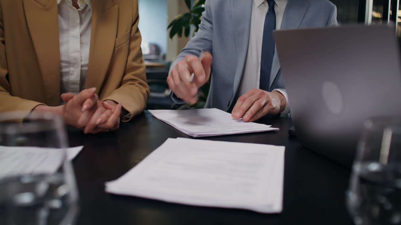 Business People Signing Contracts