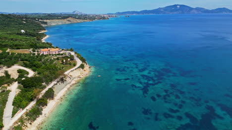 Zante-resort-town-sandy-beach-coastline-Ionian-sea-Zakynthos-Greece,-aerial