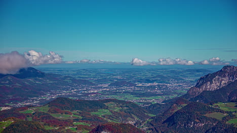 Clouds-drift-in-time-lapse-over-Austrian-Alps-landscape-unveiling-rugged-peaks