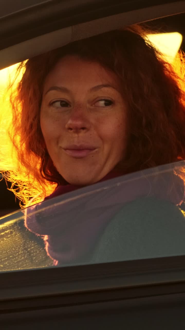 Woman Enjoying a Sunset Drive