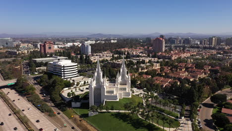 aerial view of san diego california temple near la jolla community - orbiting drone shot