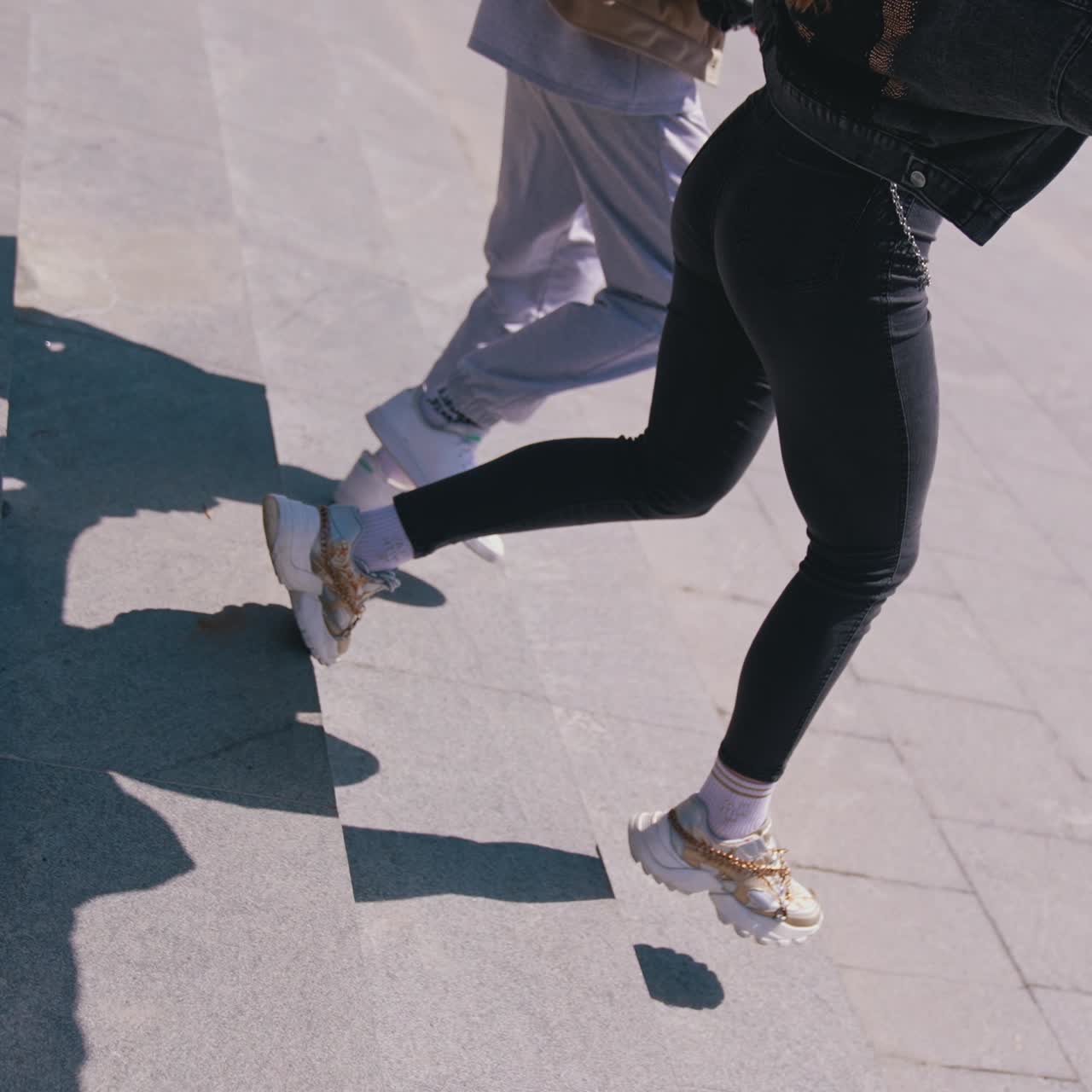 Friends walking by in the park. Summer lifestyle couple having fun