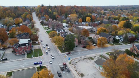 flying over suburban houses in a small ontario town in autumn