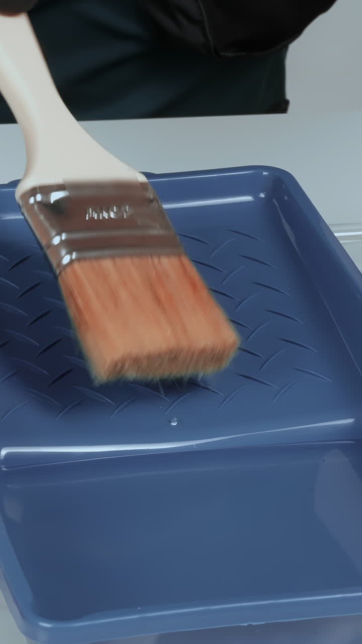 Painting with a paintbrush and tray