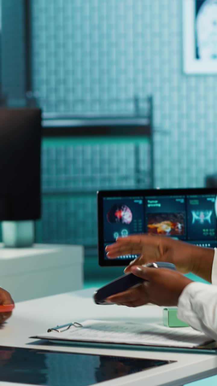 Patient Paying for Medical Services with Credit Card at Clinic