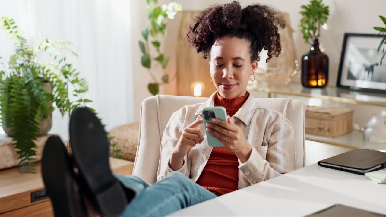 Woman Relaxing and Using Phone in Home Office