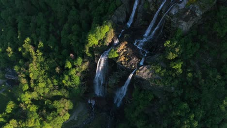 dramatic waterfall in sondrio, italy mountains, acquafraggia cascade aerial landscape