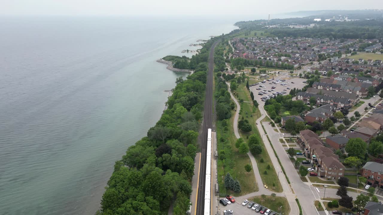 Aerial view of Pickering rooftops and distant waterfront horizon