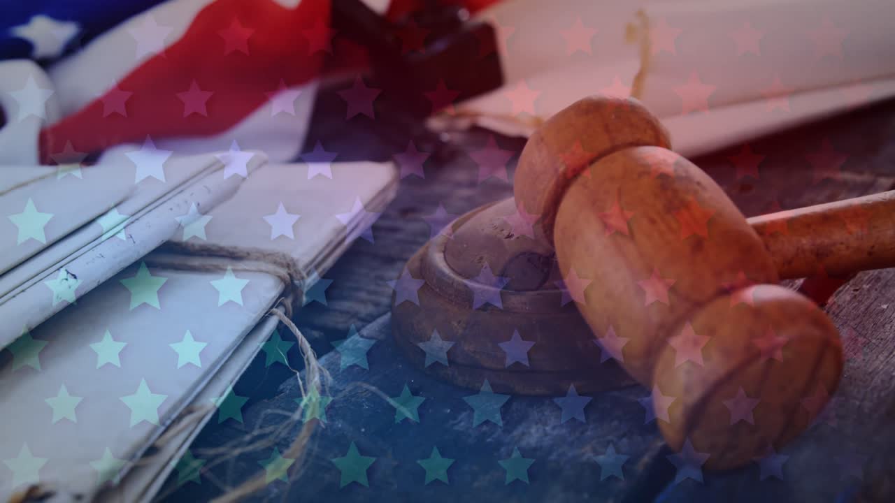 Animation of american flag over judge's hammer and files