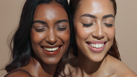 two smiling women with beautiful skin