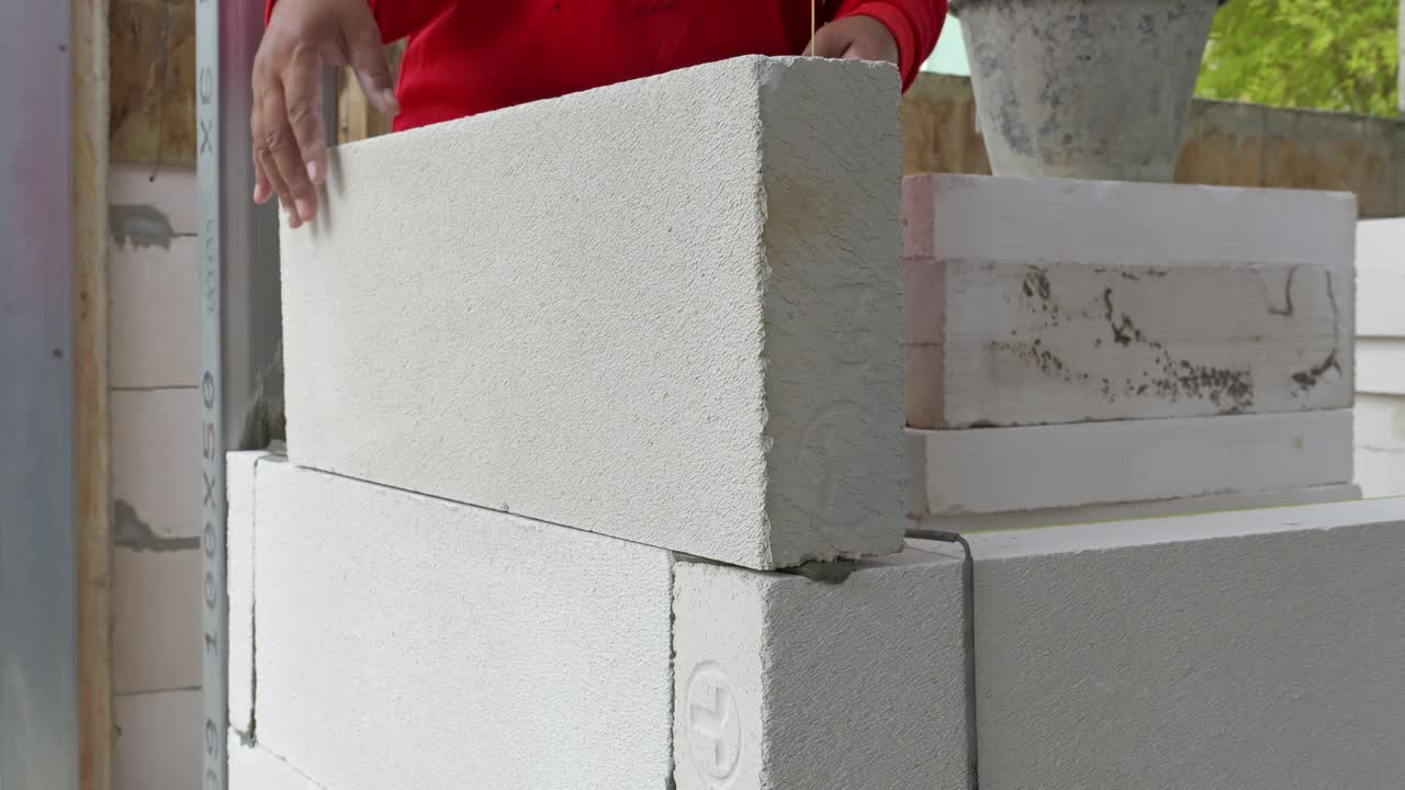 Watch step-by-step process of stacking building blocks for construction projects