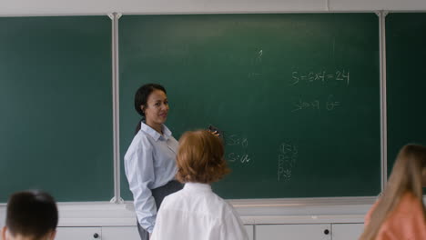 teacher and students at the end of the class.