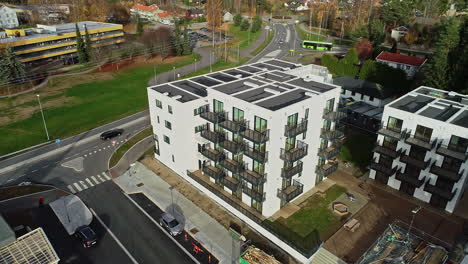 an aerial shot of a commercial region that is located in the town outskirts