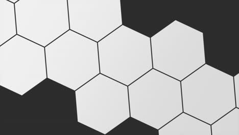 white hexagons pattern on black gradient