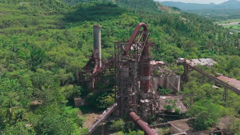 Drone-shot-of-an-abandoned-factory-in-middle-of-the-forest