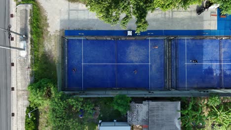 aerial view of paddle tennis court with players
