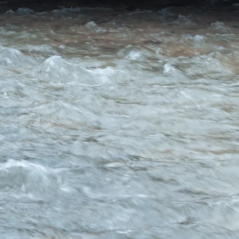 white mountain stream water falling down