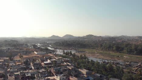 Aerial-view-of-houses-and-landscape-of-Hampi,-Karnataka,-India